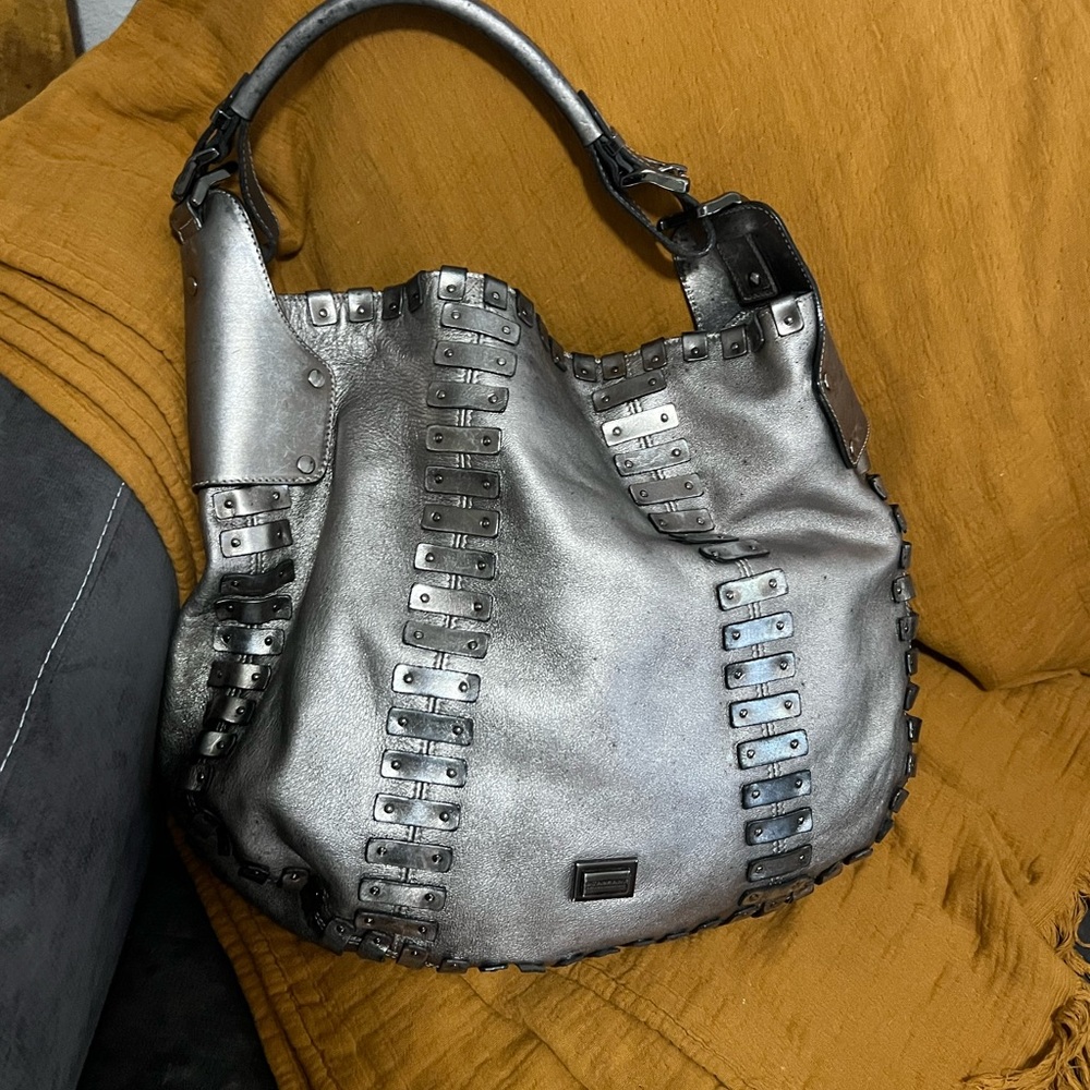 Silver industrial Burberry bag.